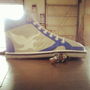 Ironically, this is the last photo I took at Shiekh Shoes. I had just received a new 13' inflatable sneaker that I had designed for events. I thought it would be funny to be crushed by the Shiekh Shoes!